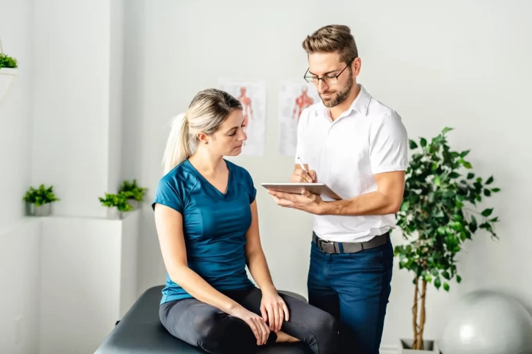 man looking at ipad with woman